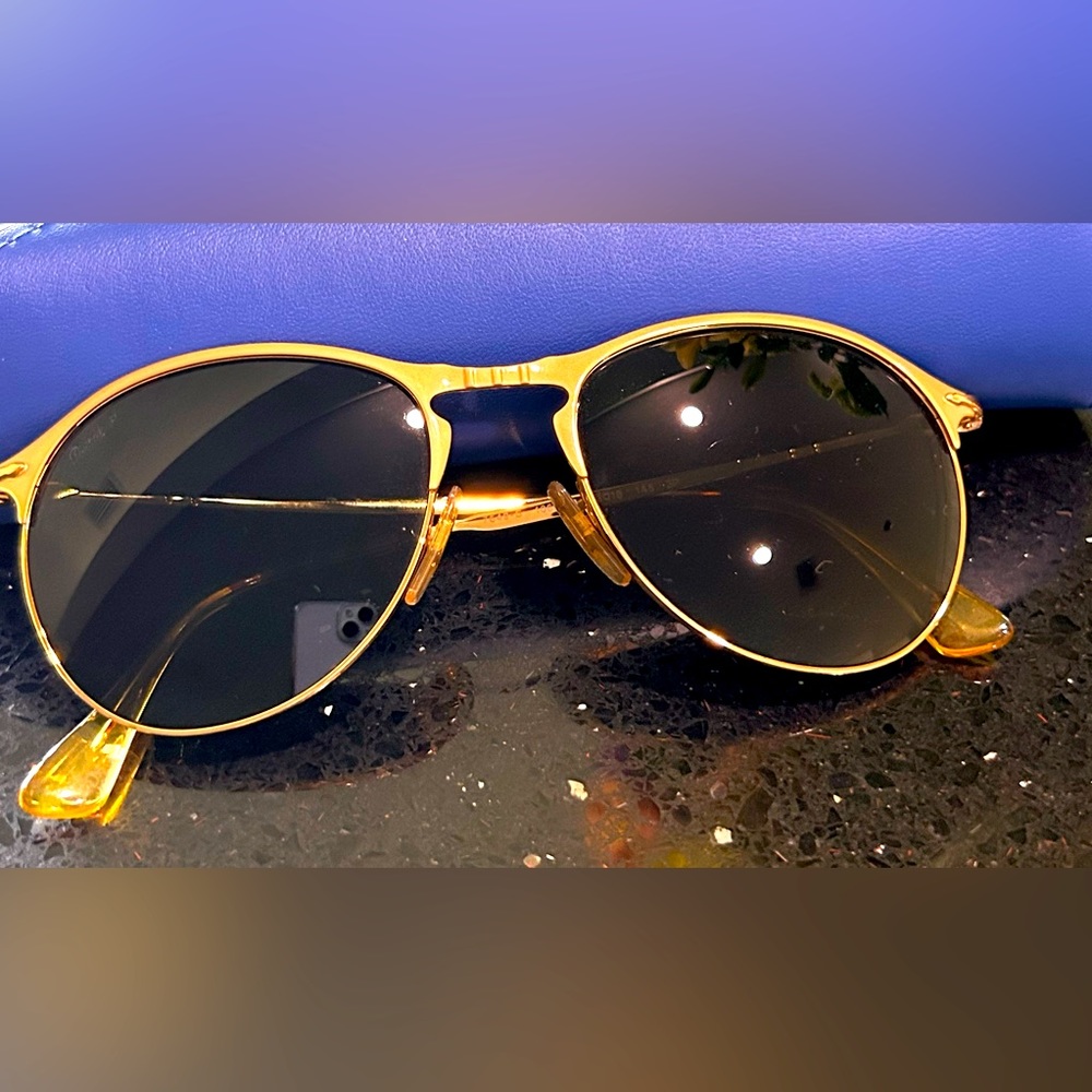 Persol Italian luxury eyewear.  Unisex aviator polarized gold frame sunglasses